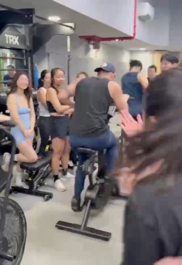 A room cheering on the bikes at a Once event in New York